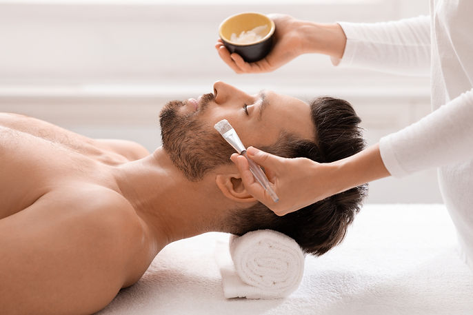 female-attendant-applying-nourishing-face-mask-on-2025-03-18-16-46-02-utc.jpg
