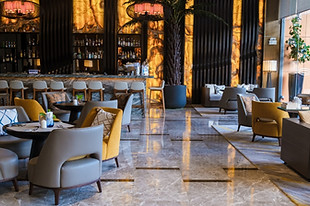 Shiny, freshly cleaned tiled floor in a busy restaurant interior