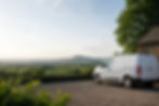 PGM pest control services unmarked company vehicle parked outside a beautiful Herefordshire farmhouse, BPCA accredited technician arriving to carry out a pest inspection for a worried homeowner with a rat infestation in the garden and a wasp nest in the loft space.