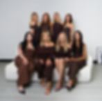 Lux Hair Lounge salon team posing for a professional group shot.