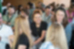 Image focuses on a woman enjoying a Catalyst workshop