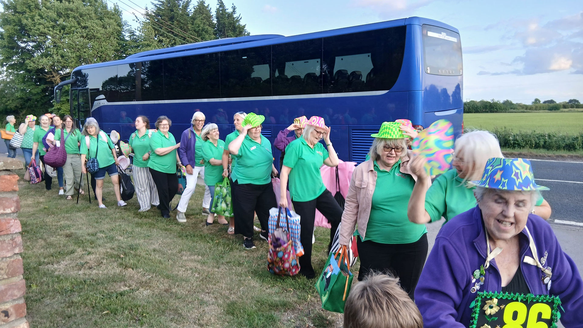 Abbey Belles exiting the coach after being dropped off, back in Selby