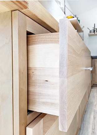 open drawer in a birch cabinet by crockett point