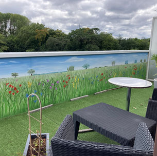 Balcon champs de fleurs