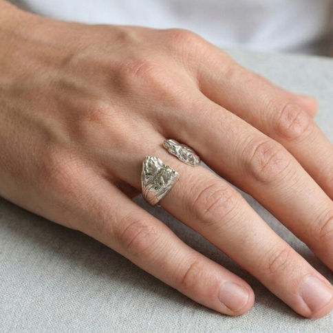 Canyon handmade silver unisex ring on a hand