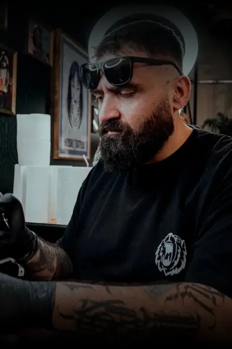 RTB, tattoo artist at Unclechronis Tattoo studio in Athens