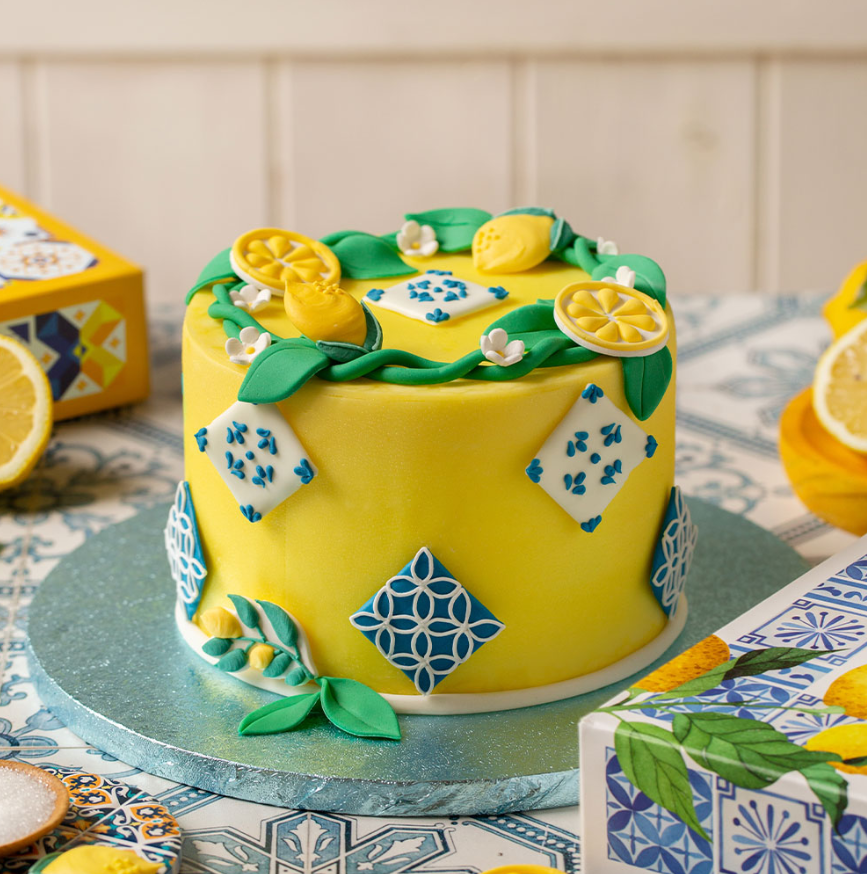 Yellow lemon cake with blue and white tile decorations