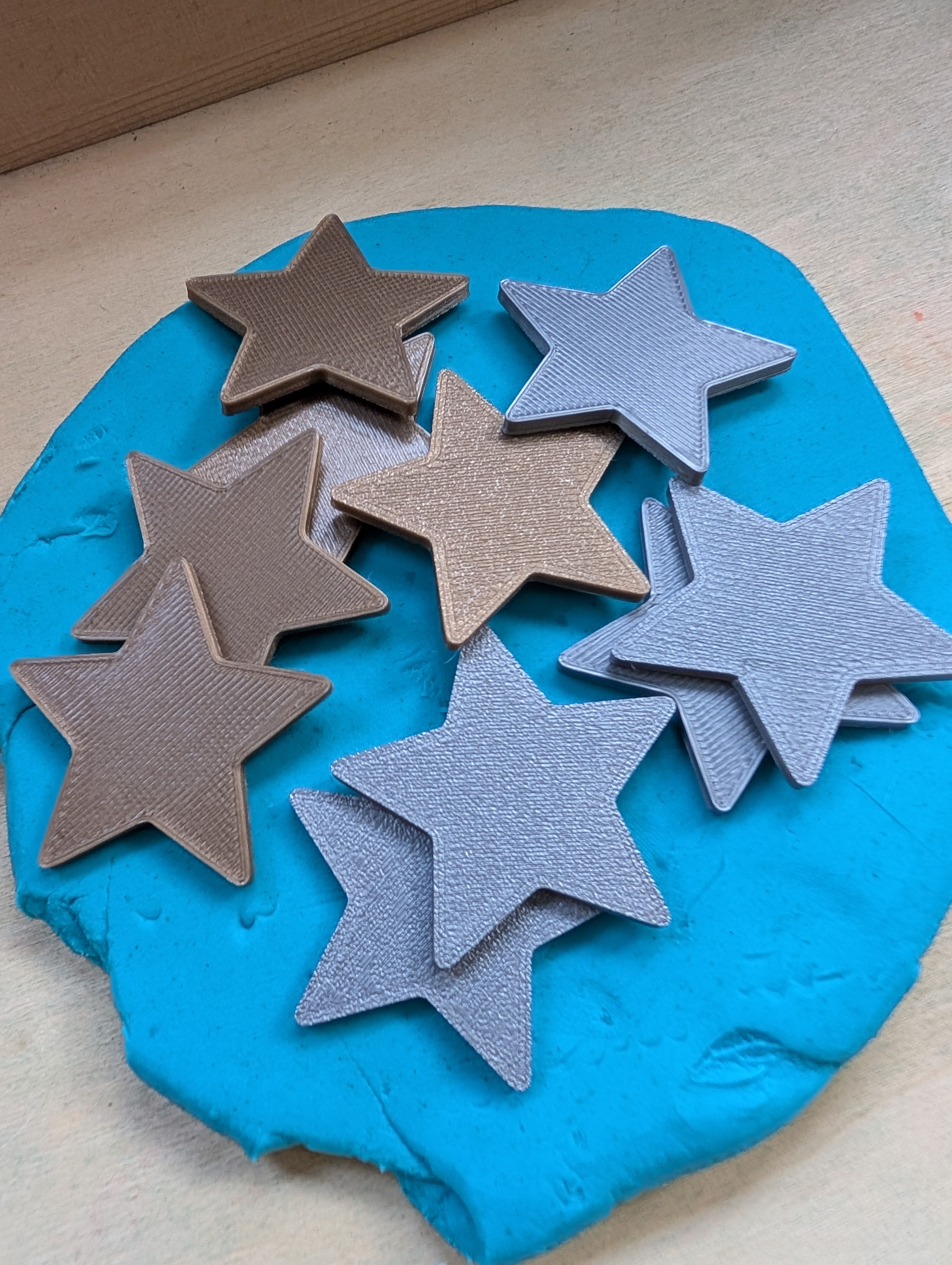 Bag of 10 silver and gold star Counters