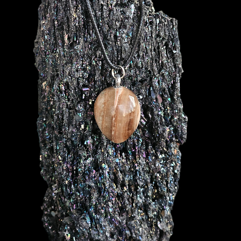 Thumbnail: Side view of Brown Calcite pendant