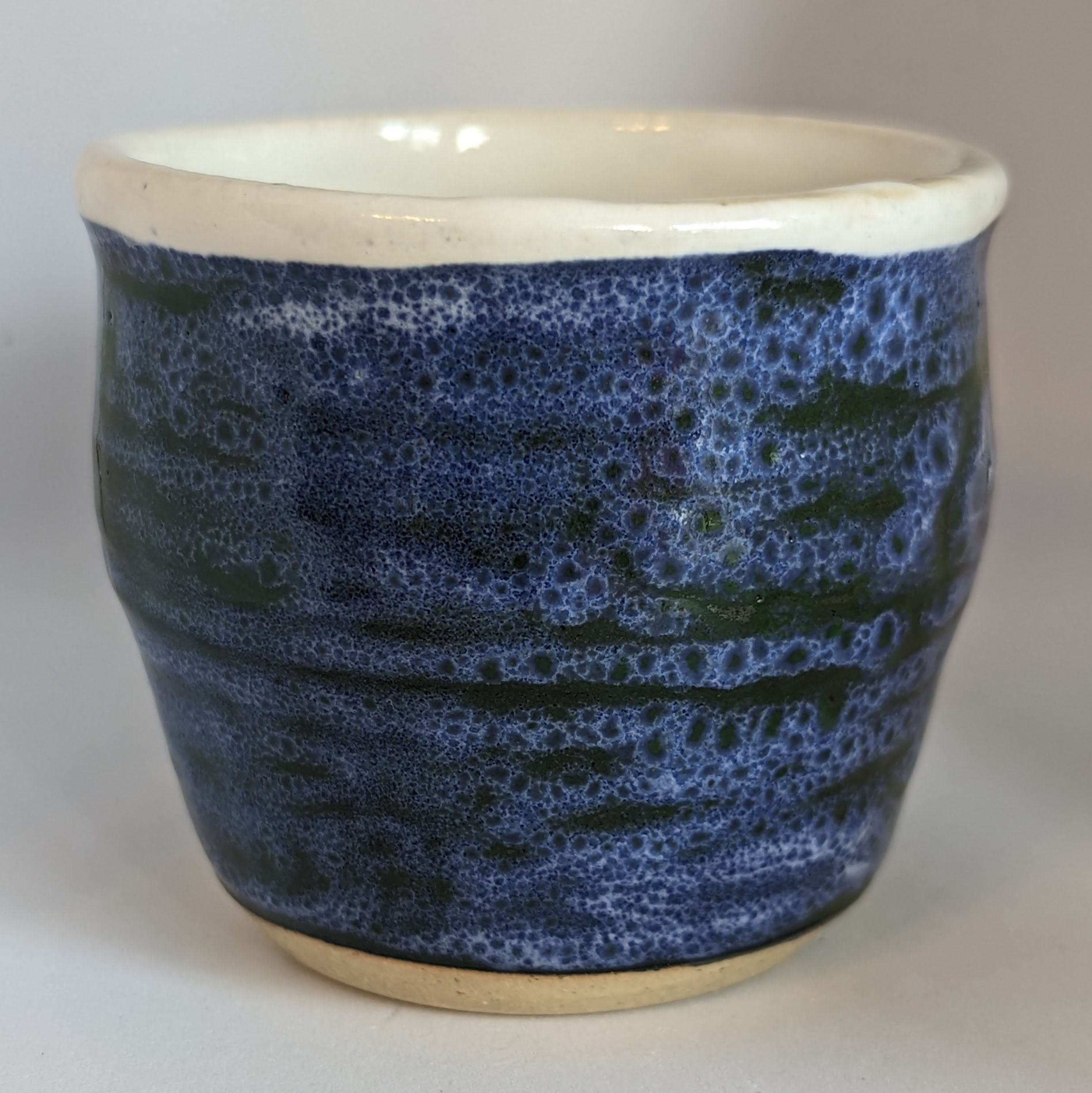 STONEWARE CUP by TC Pottery Studio - Mackenzie White over Junebug