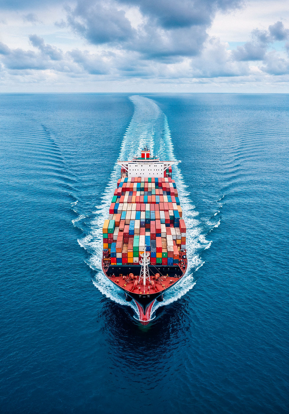 cargo-ship-sailing-through-ocean.jpg