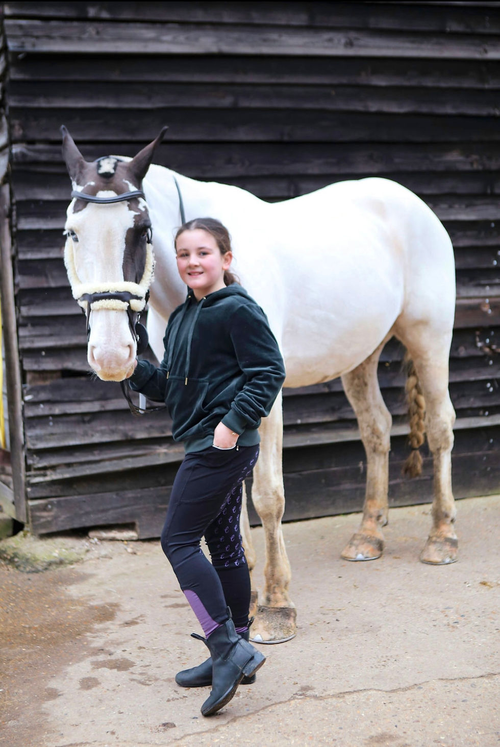 Thumbnail: Children's black and purple riding leggings