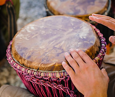 Djembes and other low skill percussion play teaches listening skills