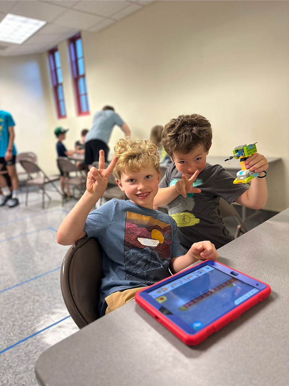 Kids having fun at summer LEGO camp