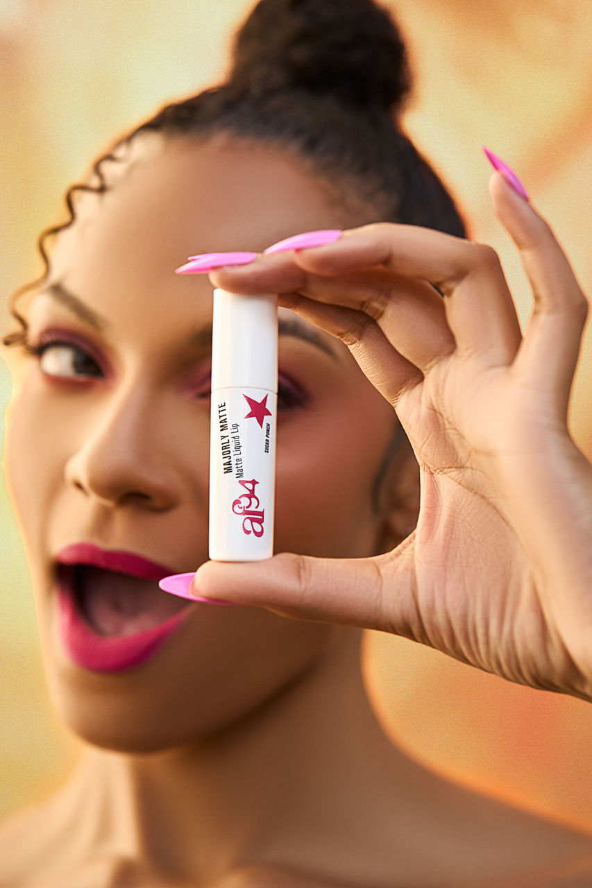 Model posing with lipstick
