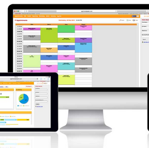 Devices displaying scheduling software: a desktop with a colorful calendar, a tablet with charts and graphs, and a phone with a schedule.