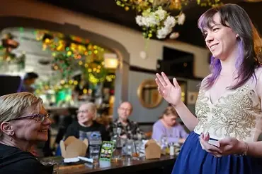 Brielle doing magic at a restaraunt