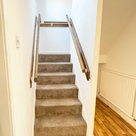 Entrance hallway with staircase to first floor.