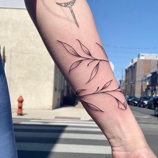 philly tattoo / illustrative blackwork tattoo / vine wrap tattoo
