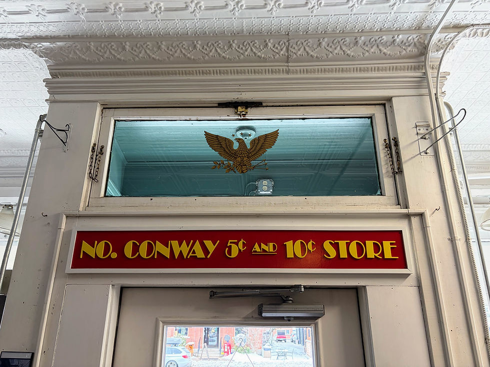 inside door with sign and eagle on window