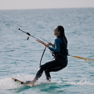 Student is kiting her first meters meanwhile her Kite Basic lesson at the Ponta Preta Beach
