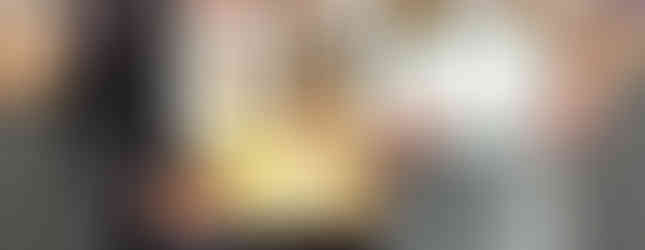 Lauren Dusing, winner of the art contest, with Jennifer Rodriguez and Megan Dulkynis