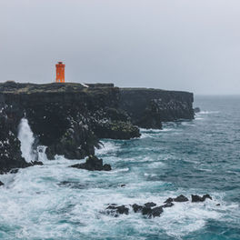 Lighthouse on a cliff.