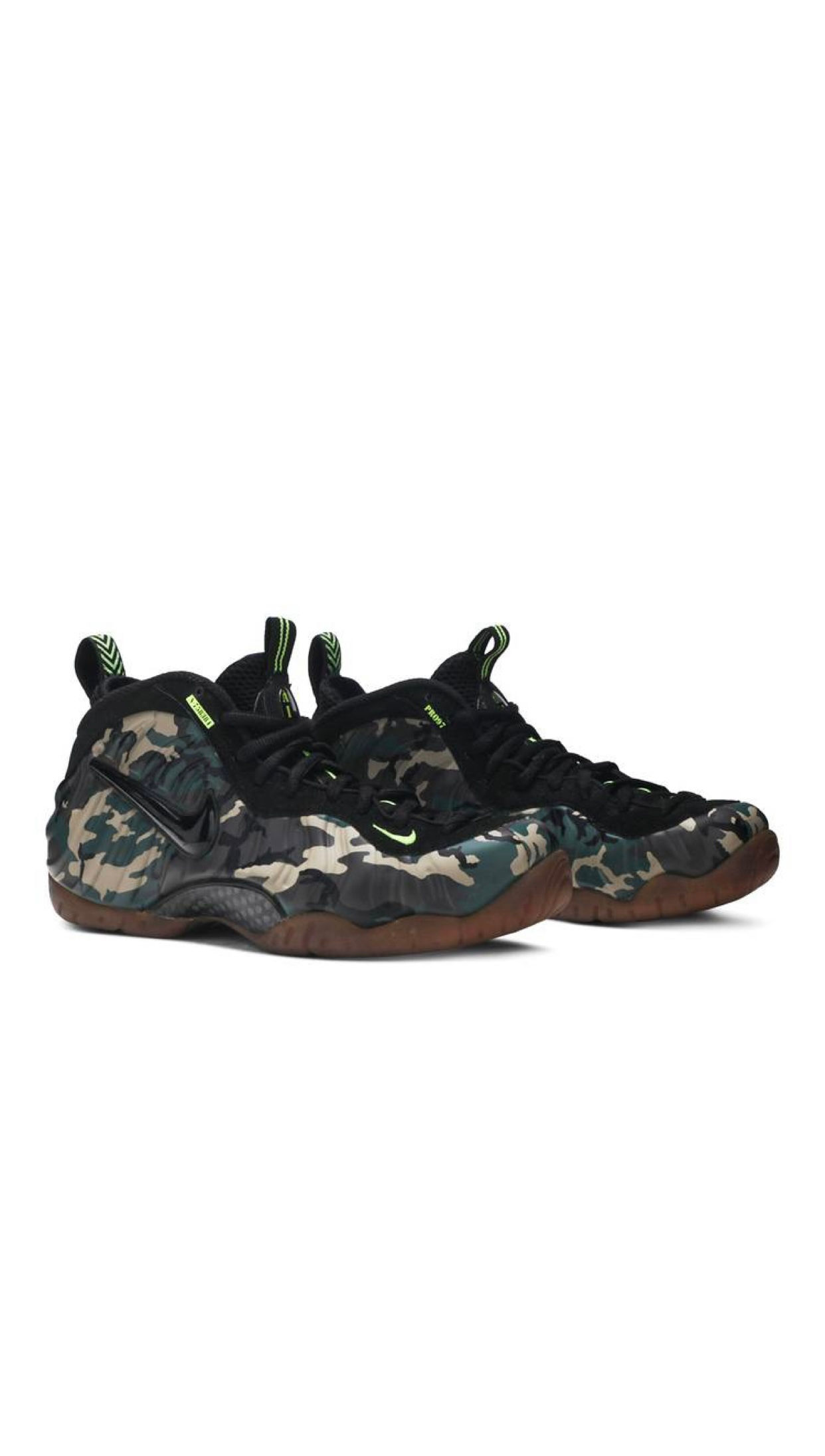 Pair of Nike Foamposite sneakers with woodland camouflage pattern and gum sole.