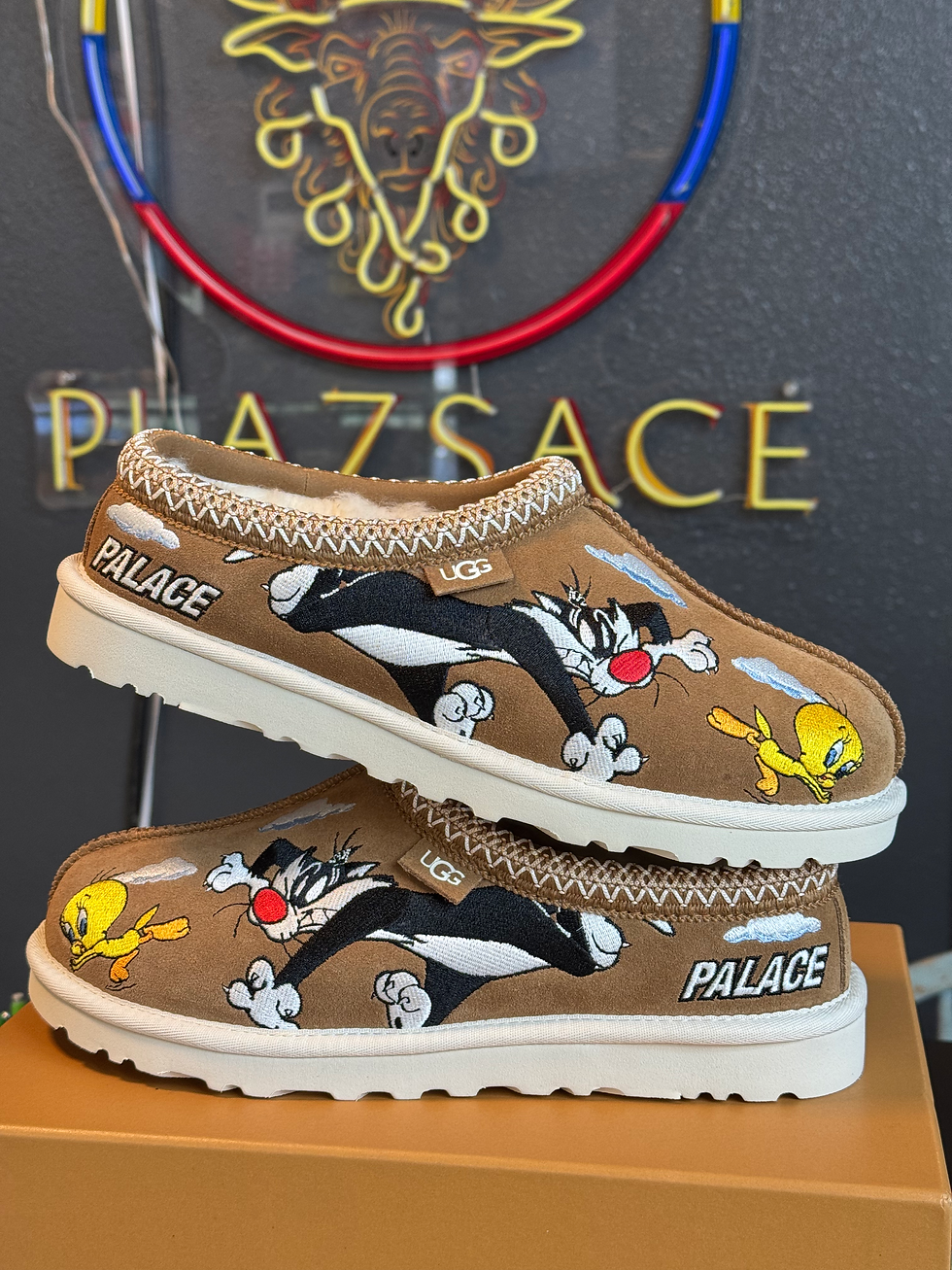 Brown UGG slippers featuring Sylvester, Tweety, "PALACE", "PLAZSACE" sign.