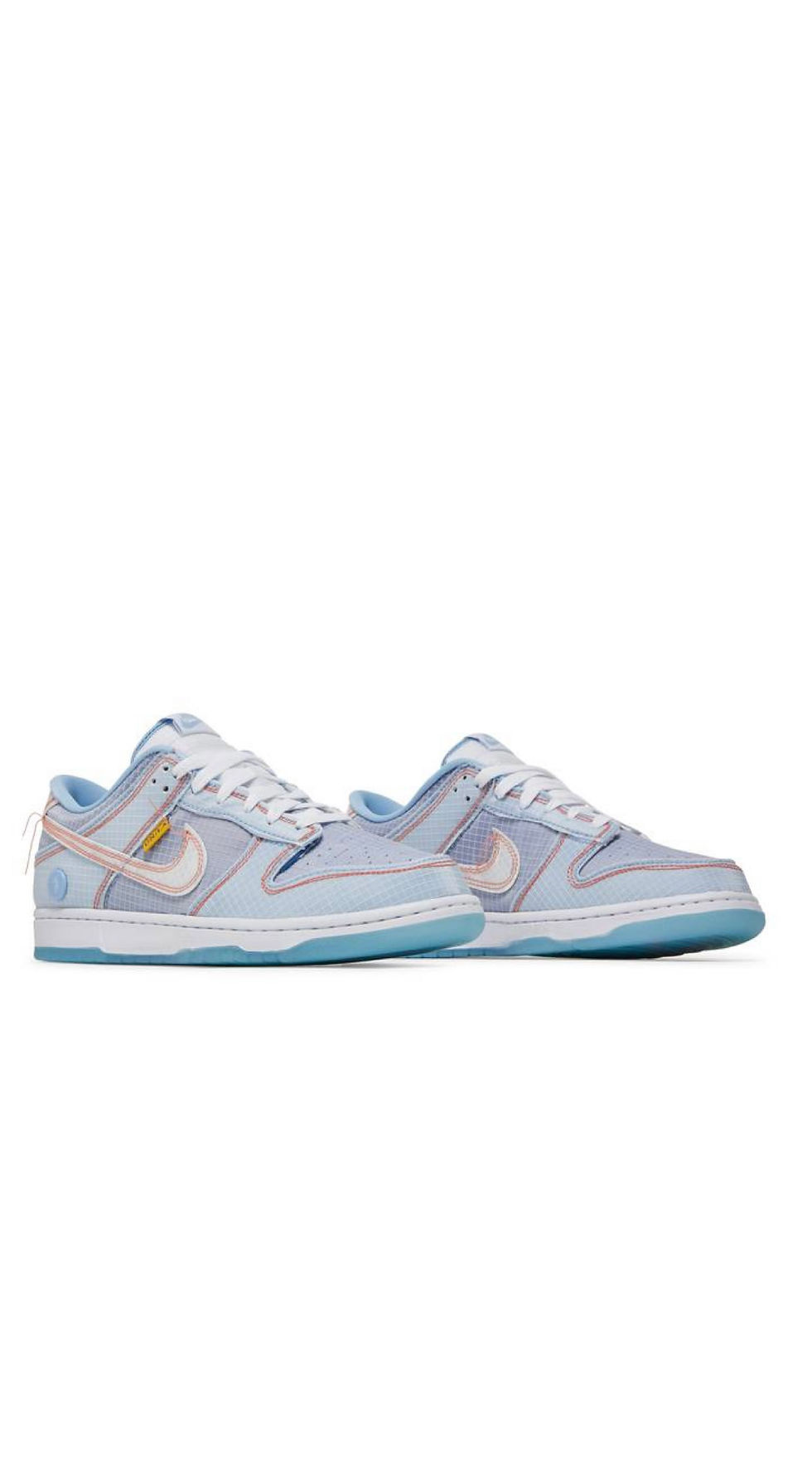 Pair of light blue denim Nike Dunk Low sneakers, contrast stitching.