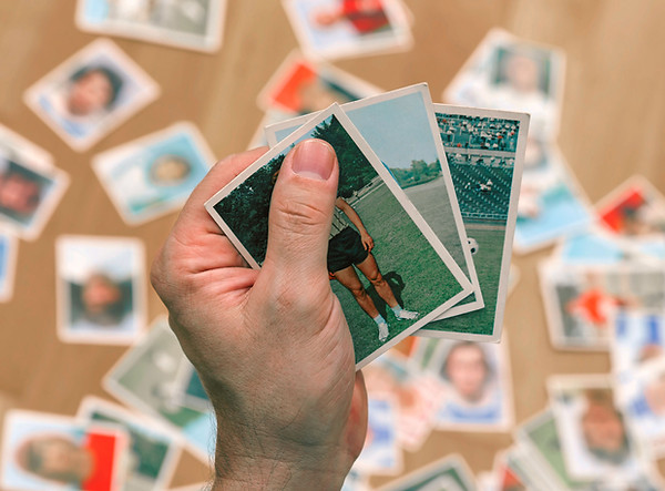 Male Holding Trading Cards