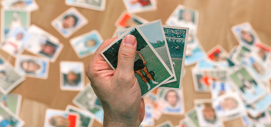 Male Holding Trading Cards