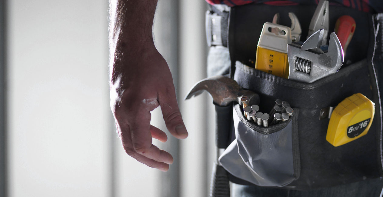 Man Wearing Tool Belt_edited.jpg