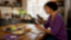 Woman scanning wine bottle label with app