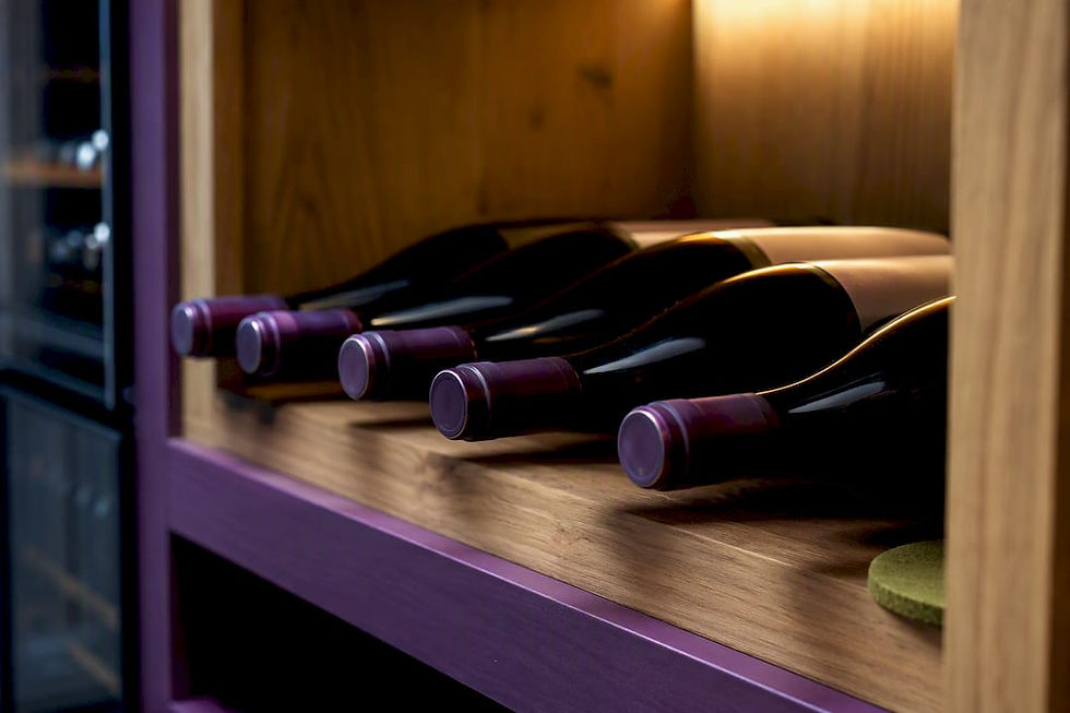 Wine bottles resting horizontally in storage
