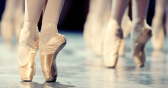 Dancers on pointe, close up of feet