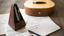 Sheet Music and Guitar