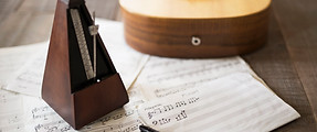 Sheet Music and Guitar