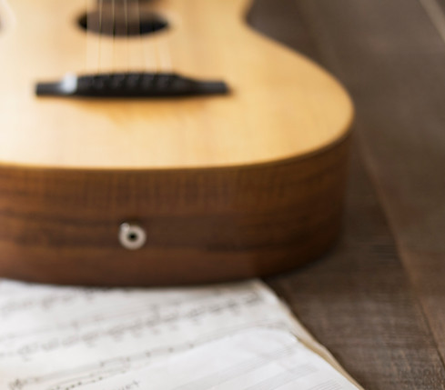 Sheet Music and Guitar
