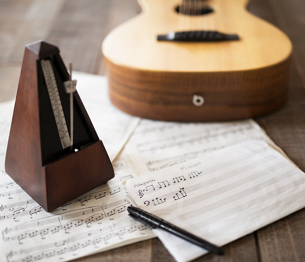 Sheet Music and Guitar