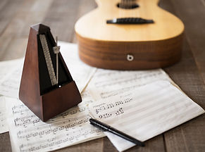 Sheet Music and Guitar