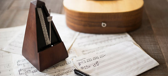 Sheet Music and Guitar