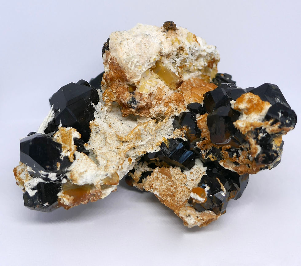 Shiny Schorl on Silver Topaz and Feldspar