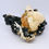 Thumbnail: Shiny Schorl on Silver Topaz and Feldspar