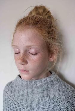 art, conceptual, photograph staring child youth jumper grey sad