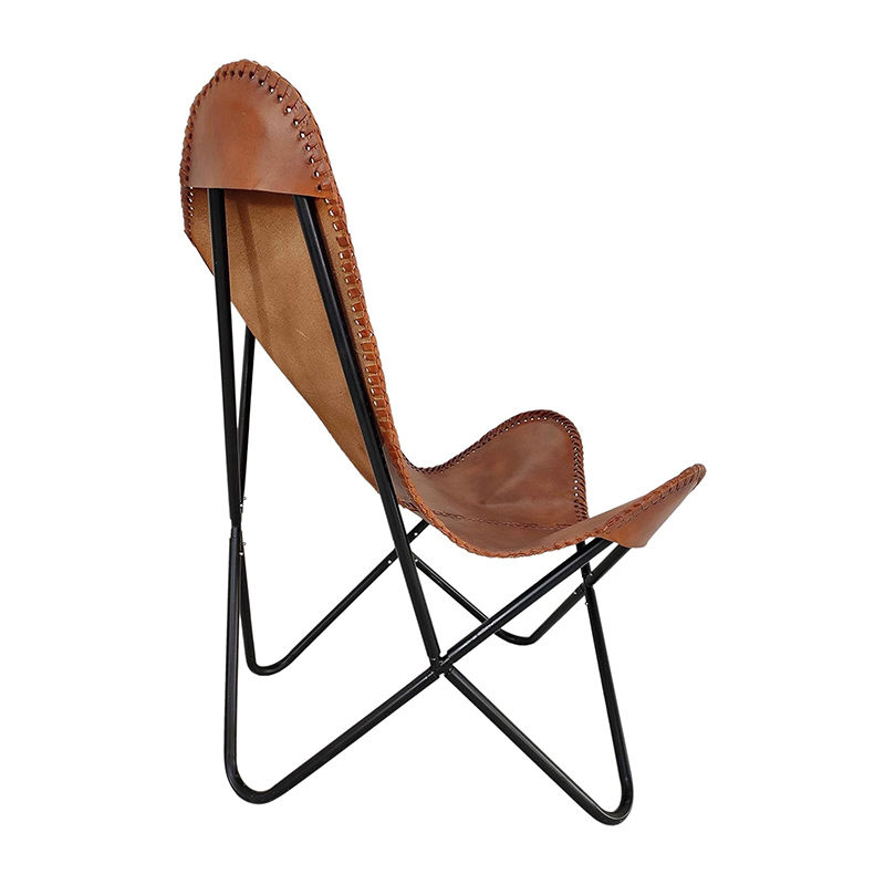 Thumbnail: Side profile of ergonomic leather butterfly chair in modern living room