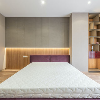 Modern bedroom interior design with large bed