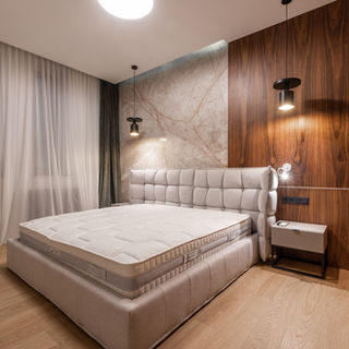 Luxury bedroom interior: Plush bed, wood paneling, viona2