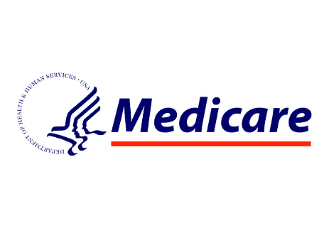 Image of an indvidual holding a Medicare insurance card.