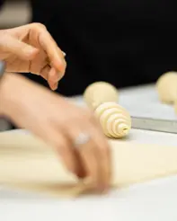 Chef Avin Thaliath shaping dough